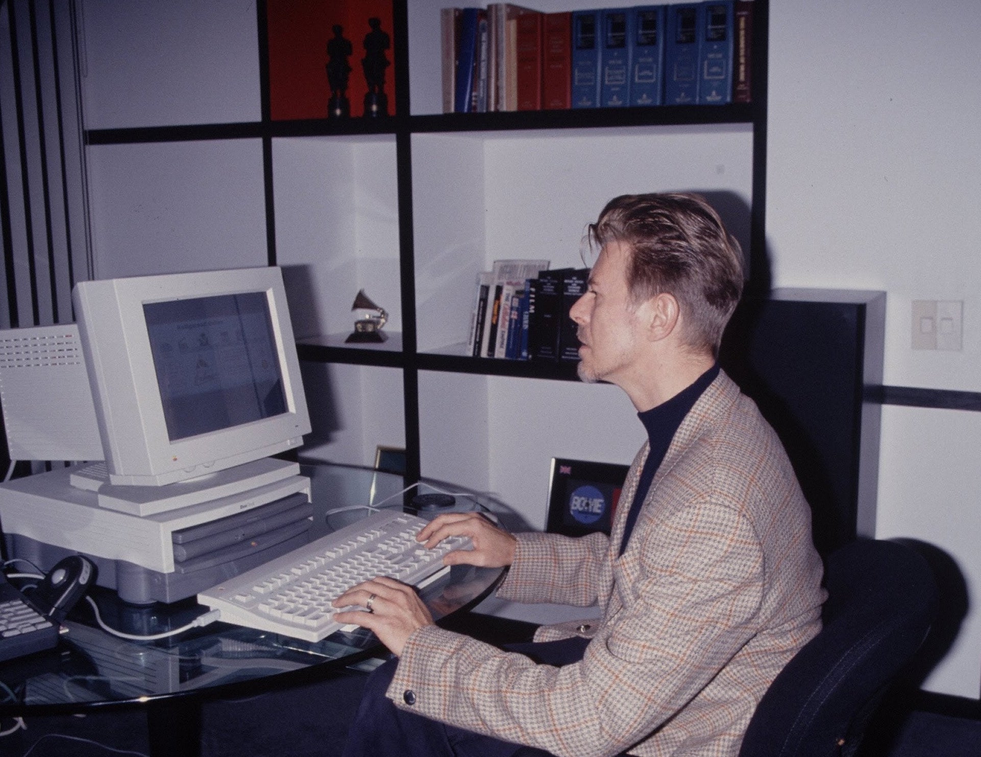 David Bowie uses a computer in the 1990s